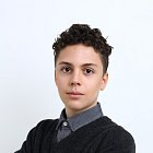 August E.